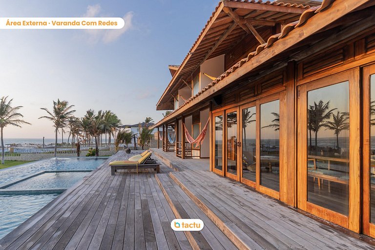 Mansão, paraíso a beira mar por Tactu Homes