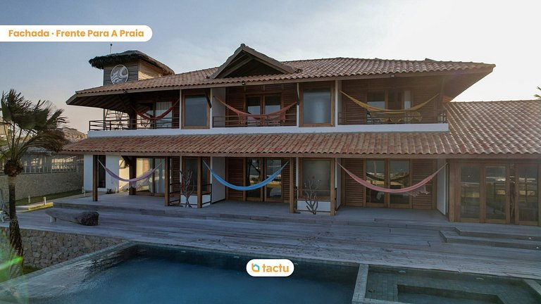 Mansão, paraíso a beira mar por Tactu Homes